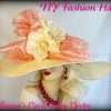 Ladies Dramatic Ivory Coral Wide Brimmed Stylish Fashion Hat With A Large Bow And Flowers, Mother Of The Bride Hats