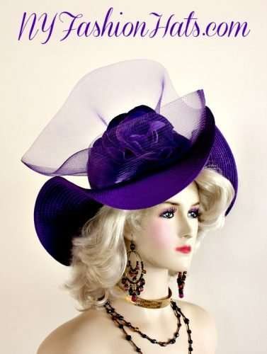 Women's Purple Designer Satin Braid Wide Wavy Brimmed Fashion Hat Adorned With A Large Purple Crinoline Bow, Enhanced With A Hand Made Velvet Millinery Flower. NY Fashion Hats, www.nyfashionhats.com Specialize In Designer Hats For Women, Hats For Weddings, Cocktail Hats, Haute Couture Hats For Women, High Fashion Hats, Hats For Brides, Kentucky Derby Hats, Preakness Stakes Hats, Belmont Stakes Hats, Royal Ascot Hats, Hats For Horse Races, World-Class Thoroughbred Horse Racing Hats, Custom Harness Racing Hats For The Racetrack, Melbourne Cup Hats, Del Mar Race Track, Santa Anita Park, Dubai World Cup, Virginia Gold Cup, Saratoga NY Racetrack, Hats For Casino Stage And Entertainment Shows, Hats For Formal Affairs. Garden Tea Party Hats, Mother Of The Bride Or Groom Hats, Church Hats, Easter Sunday Hats, And Hats For Dress-Up Events. Ladies Purple Wide Brimmed Satin Designer Dress Hat NY Fashion Hats